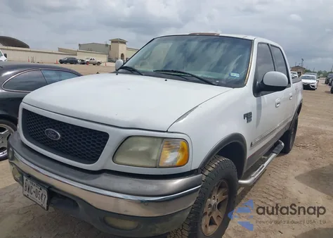 2002 Ford F-150 Lariat/Xlt z USA, uszkodzony, nr VIN 1FTRW08L92KB71311